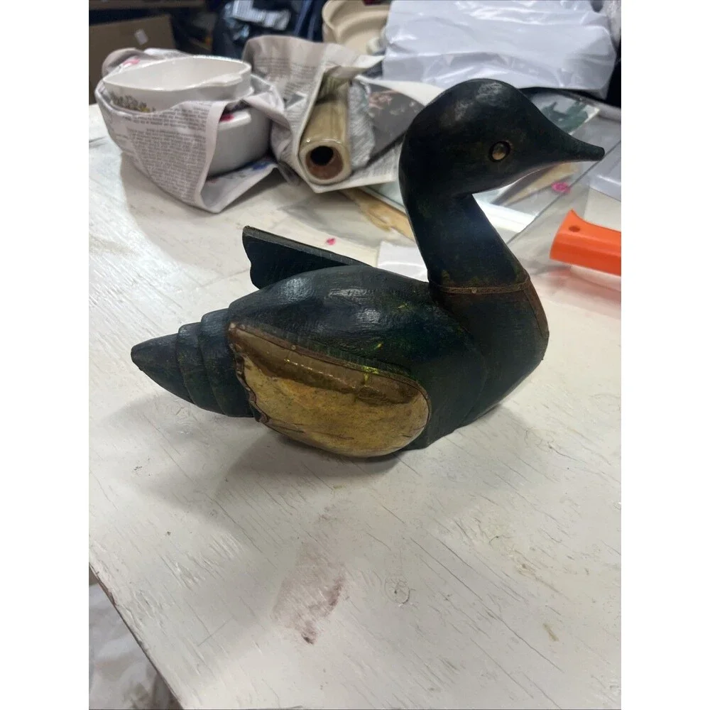 Unique wood and metal carved duck
